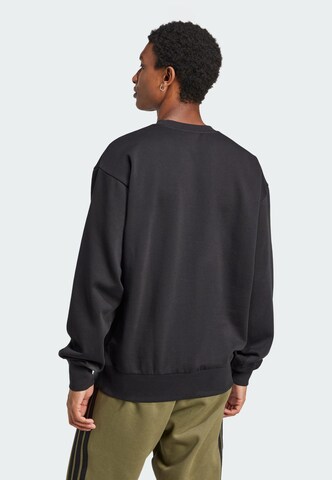 ADIDAS SPORTSWEAR Sports sweatshirt 'Essentials Feelcozy' in Black