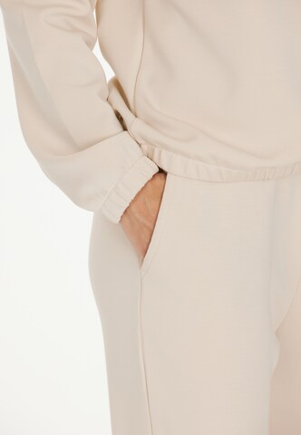 ENDURANCE Tapered Workout Pants 'Timmia' in Beige