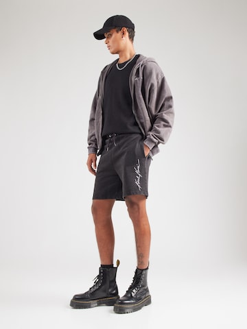 Loosefit Pantaloni di Karl Kani in nero