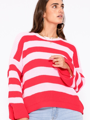 SASSYCLASSY Sweter oversize w kolorze różowy