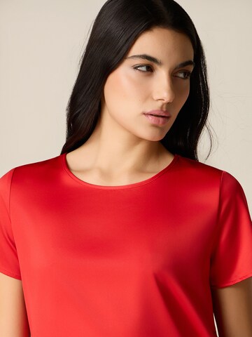 Maglietta di oltre in rosso