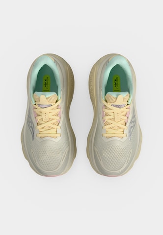 Chaussure de course saucony en beige