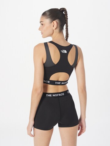 THE NORTH FACE - Soutien Bustier Soutien de desporto em preto