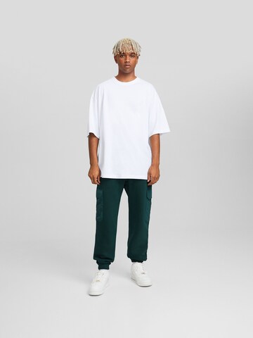 Bershka Tapered Hose in Grün