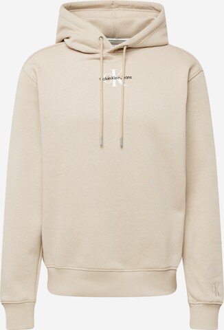 Sweat-shirt Calvin Klein Jeans en beige : devant