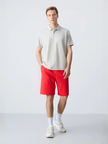 Pantaloni di Tommy Life in rosso