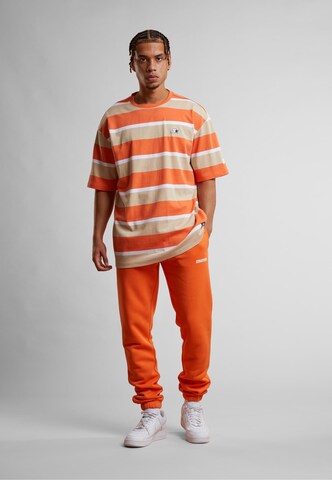 Starter Black Label Tapered Trousers 'Essential' in Orange