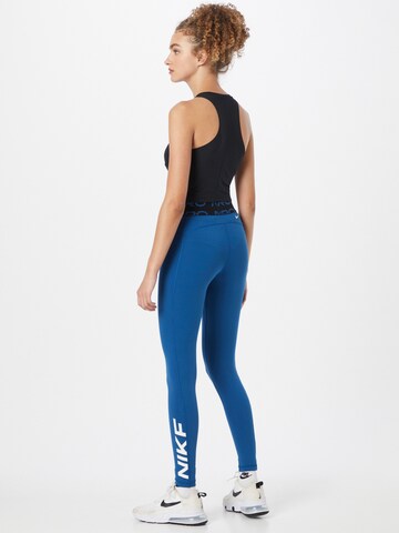 NIKE Skinny Sportbroek in Blauw