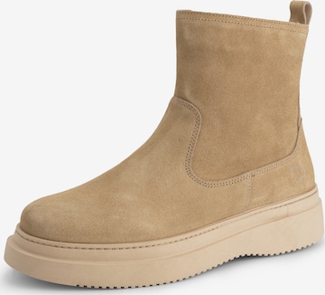 Travelin Boots i beige: forside