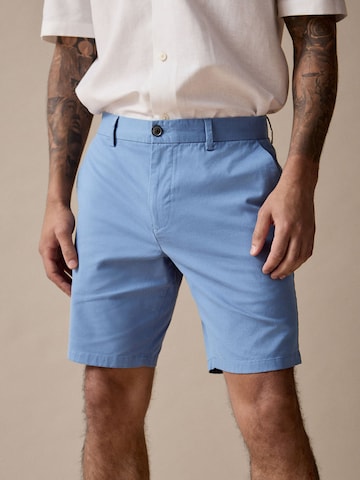 Slimfit Pantaloni chino di Next in blu: frontale