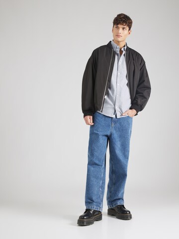 Tommy Jeans Средняя посадка Рубашка в Синий