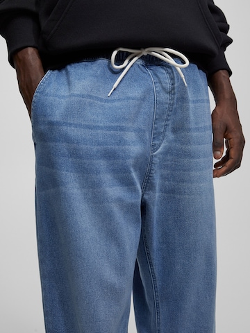 Pull&Bear Tapered Jeans i blå