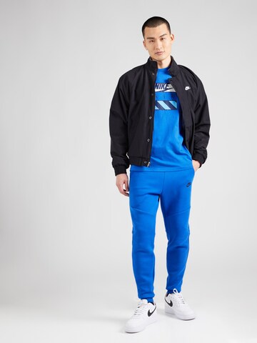 Nike Sportswear Tapered Παντελόνι 'TCH FLC' σε μπλε