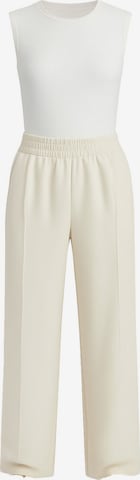 Touche Prive Loose fit Pleated Pants in Beige: front