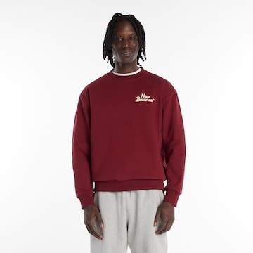 Sweat-shirt new balance en rouge : devant