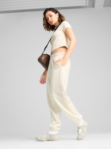 PUMA Tapered Nadrág 'WARDROBE ESS' - fehér