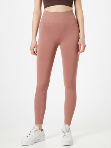 Athlecia Skinny Sportbroek 'Okalia' in Bruin: voorkant