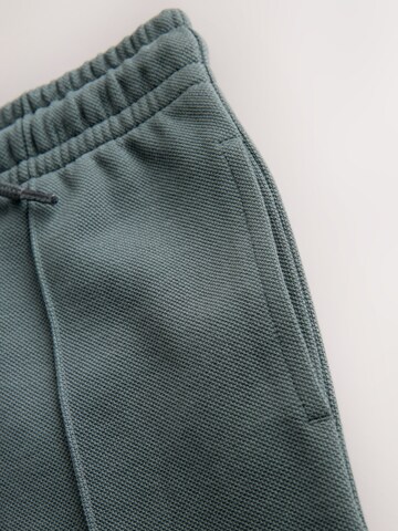 Next Normalny krój Spodnie w kolorze zielony