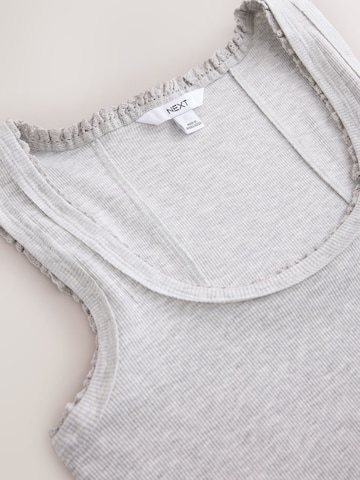 Haut Next en gris