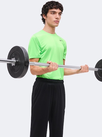 NIKE regular Παντελόνι φόρμας 'FLEX' σε μαύρο