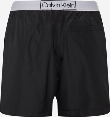 Calvin Klein Swimwear شورت سباحة بلون أسود