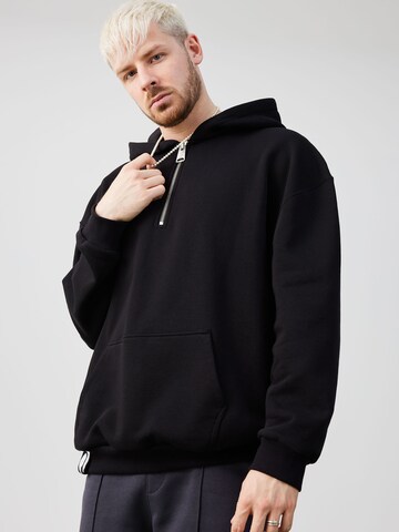 ABOUT YOU x Rewinside - Sudadera 'Elias' en negro: frente