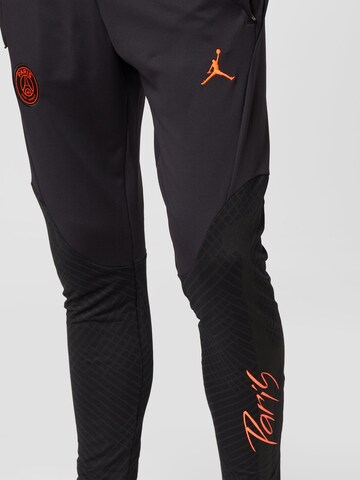 NIKE Tapered Workout Pants in Black