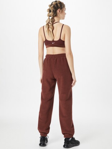 Nike Sportswear Tapered Pants in Brown