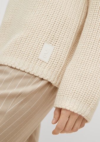 Pullover di comma casual identity in beige