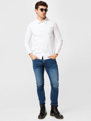 QS Slimfit Džíny – modrá