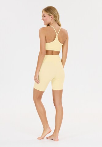 Athlecia Low Support Sport-BH 'Blossom' in Gelb