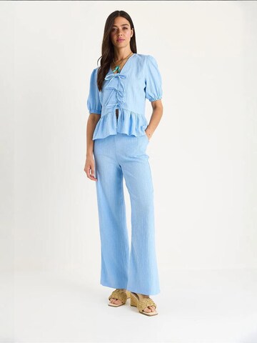 Pantalons de tailleur Bianco Lucci en bleu