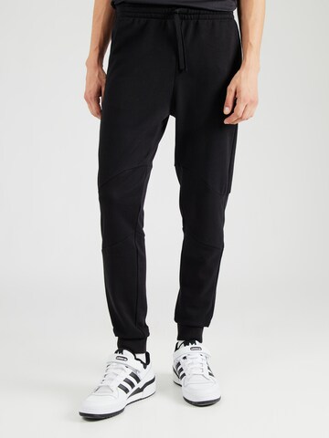Champion Authentic Athletic Apparel Tapered Sporthose in Schwarz: Vorderseite