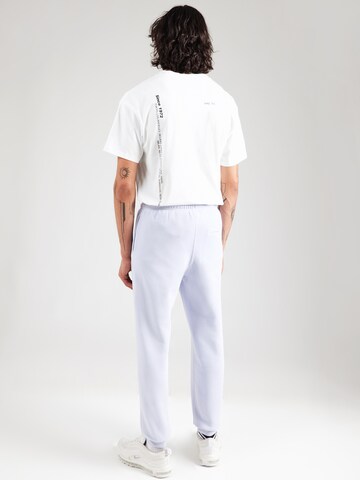 Nike Sportswear Tapered Housut 'CLUB' värissä sininen