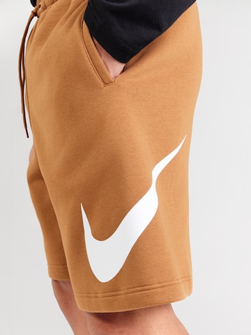 Nike Sportswear Loose fit Trousers 'CLUB' in Brown