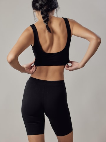 Top 'Sportivo' di OWN Off With Nature in nero