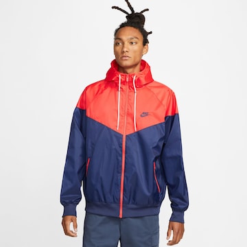 Nike Sportswear Between-season jacket 'Heritage Essentials' in Blue: front