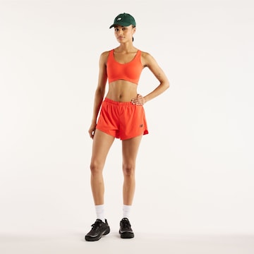 new balance - regular Pantalón deportivo 'RC Essential 3' en naranja