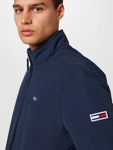 Tommy Jeans Between-Season Jacket 'Essential' in Blue