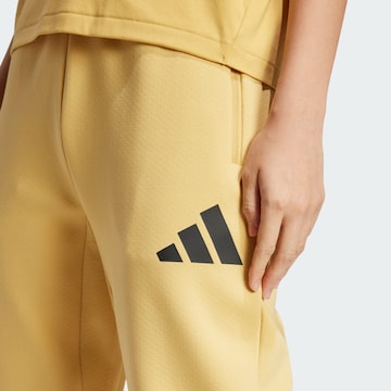 Effilé Pantalon de sport 'Z.N.E.' ADIDAS SPORTSWEAR en jaune