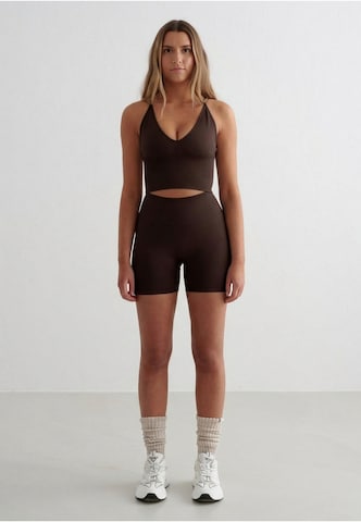 Skinny Pantaloni sportivi di Aim'n in marrone