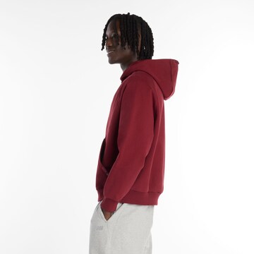 new balance - Sudadera con cremallera en rojo