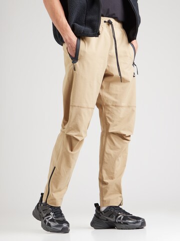 Nike Sportswear Конический (Tapered) Штаны в Бежевый: спереди