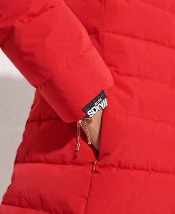 Manteau d’hiver 'Arctic' Superdry en rouge