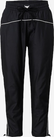 Pantaloni sport de la UNDER ARMOUR pe negru: față