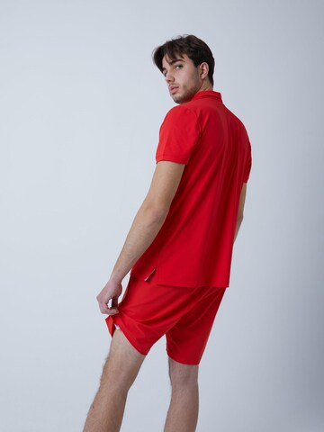 T-Shirt fonctionnel 'Polo' SPORTKIND en rouge