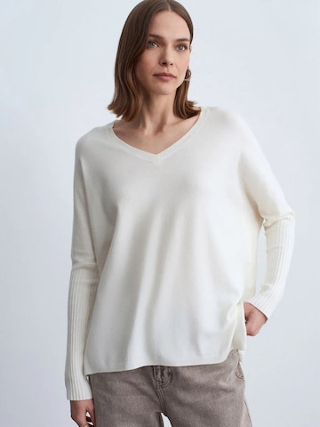 Pullover di Dilvin in beige