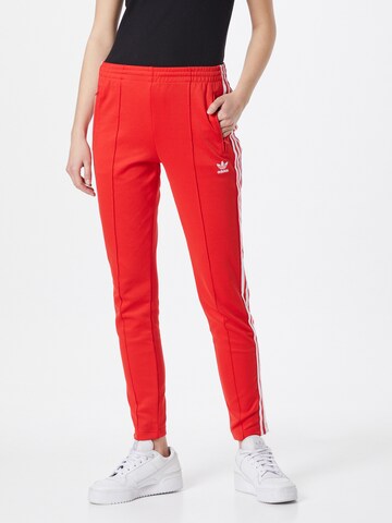 Coupe slim Pantalon 'Primeblue Sst' ADIDAS ORIGINALS en rouge : devant