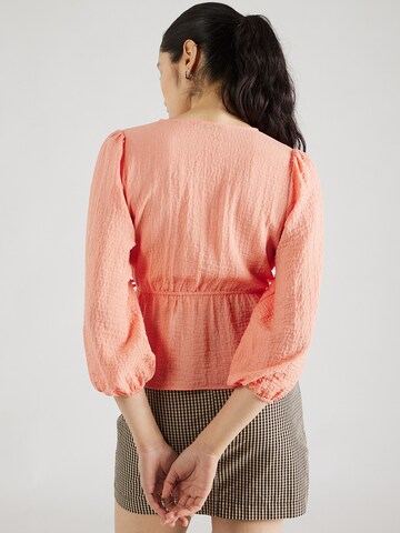 Camicia da donna 'Yareli' di ABOUT YOU in arancione