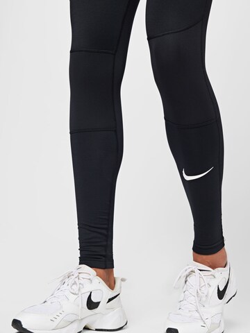 NIKE Skinny Sporthose in Schwarz